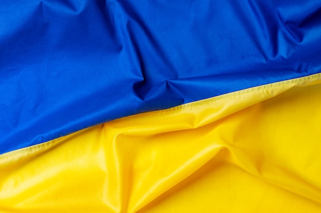 Фото Государственный флаг украины ткань текстильный фон
