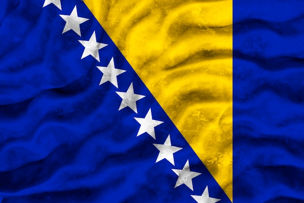 Foto bandiera nazionale della bosnia ed erzegovina sfondo con bandiera della bosnia ed erzegovina