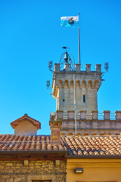 National flag of San Marino on the top of city hall (Palazzo Pubblico), San Marino