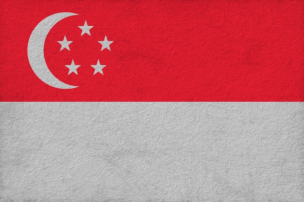 Foto bandiera nazionale di singapore sfondo con bandiera di singapore