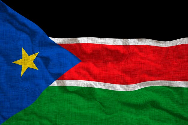 南スーダンの国旗と背景の南スーダンの国旗