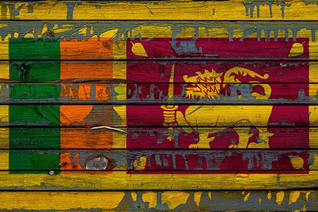 The national flag of Sri Lanka is painted on uneven boards Country symbol