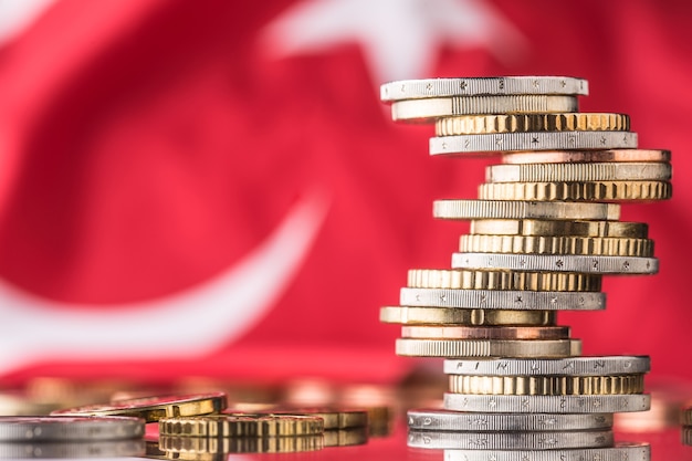 National flag of turkey and euro coins - concept. Euro coins. Euro money. Euro currency.