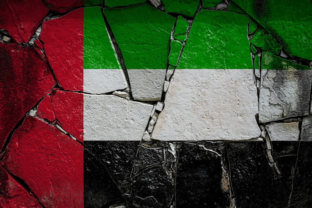 National flag of United Arab Emirates
 on an old stone wall