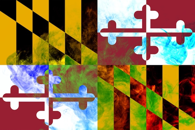 The national flag of the us state maryland in against a gray smoke on the day of independence in different colors of blue red and yellow political and religious disputes customs and delivery