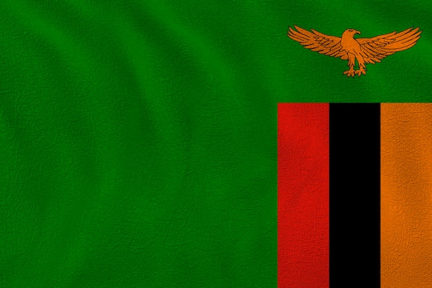 Foto bandiera nazionale dello zambia sfondo con bandiera dello zambia