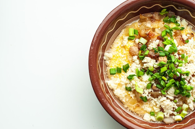 national traditional Ukrainian dish made from corn grits banosh with lard crackers and bryndza food