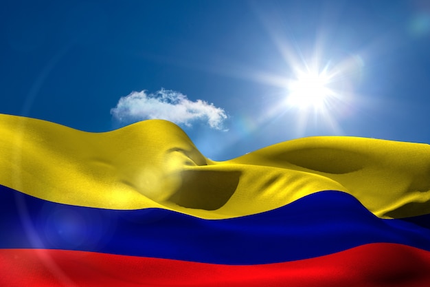 Nationale vlag van Colombia onder zonnige hemel