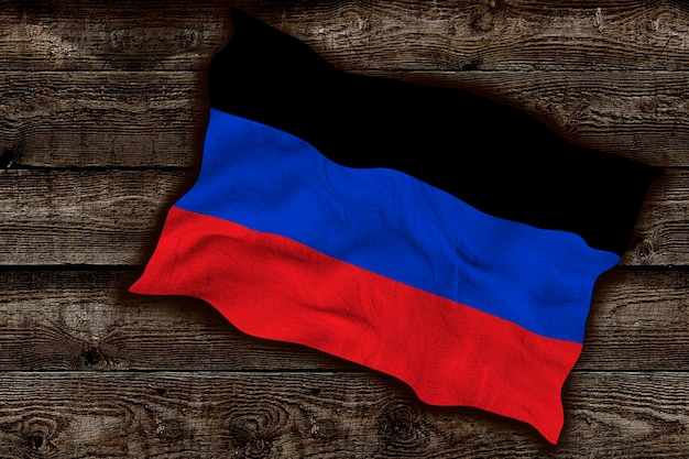 Nationale vlag van de Volksrepubliek Donetsk Achtergrond met de vlag van de Volksrepubliek Donetsk