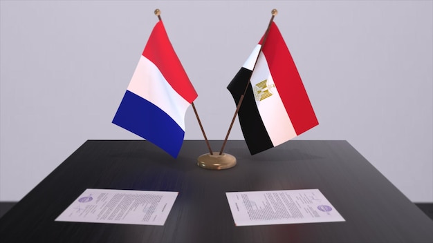 Nationale vlaggen van Egypte en Frankrijk op tafel in diplomatieke vergaderruimte Politieke overeenkomst