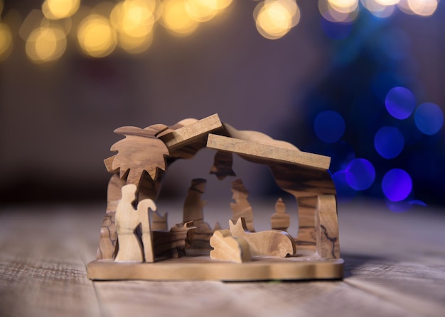 Nativity scene on a wooden backgroundxA