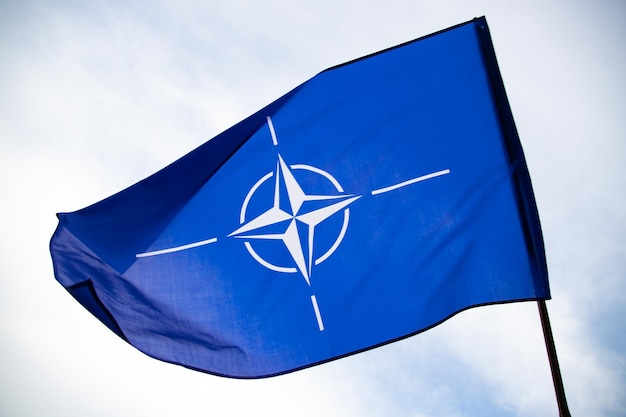 Photo nato flagnorth atlantic treaty organization flag waving