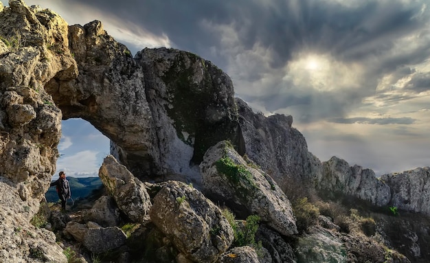 Natural arch in the peak of a mountain