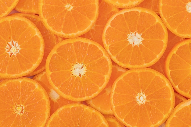 Natural backdrop of sliced tangerines