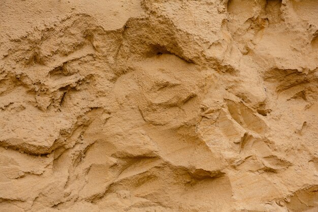 Natural background Texture of sand wall in sand pit