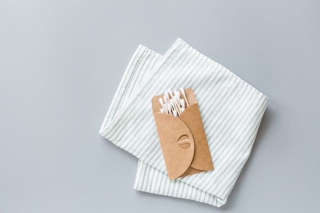 Natural bathroom accessories: ear sticks and facial towel