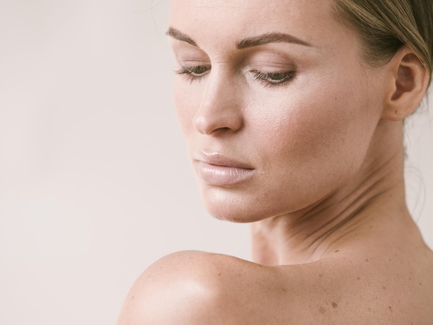 Natural beauty skin woman face close up macro model beauty. Studio shot.