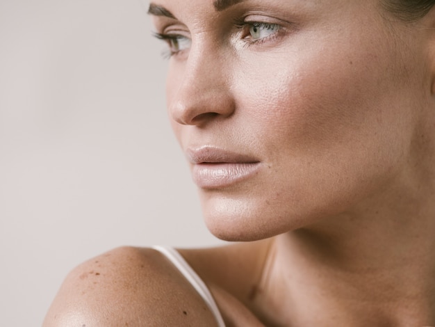 Natural beauty skin woman face close up macro model beauty. Studio shot.