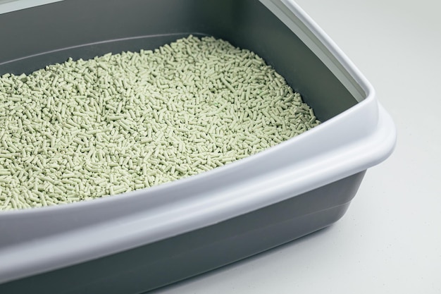 Natural biodegradable green tea tofu cat litter in litterbox