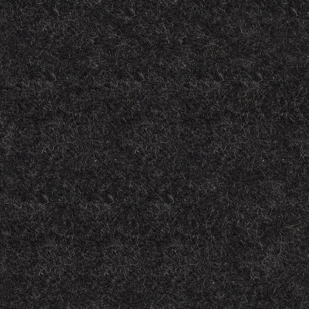Foto piastrelle di consistenza quadrata senza cuciture sullo sfondo astratto di feltro nero naturale