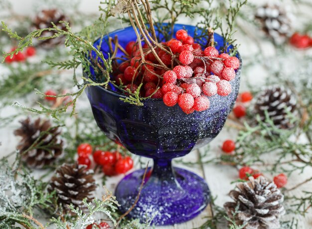  Natural Christmas ornaments in the bowl with cranberries.