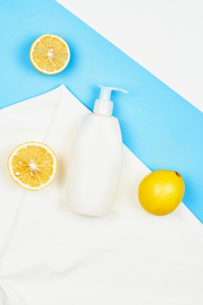 Natural cosmetic products with lemon. Refreshing glow lotion with lemon, cosmetics for smooth skin