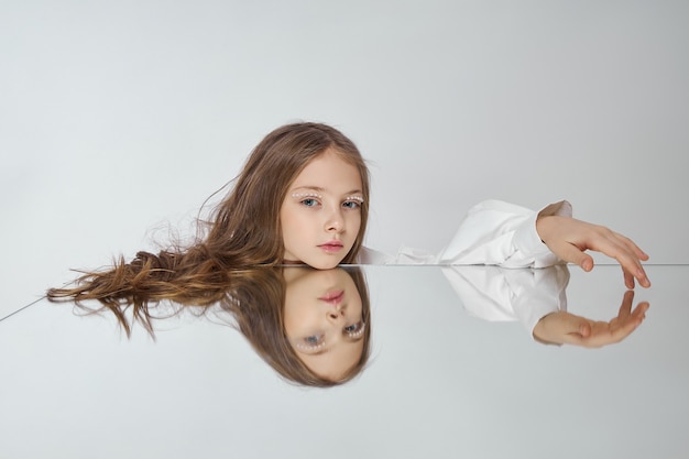 Natural cosmetics for girls. Beauty portrait of a romantic girl with beautiful long hair, a smile on her face