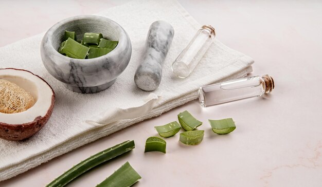 Natural cosmetics with aloe vera sea salt and handmade coconut soap on white background