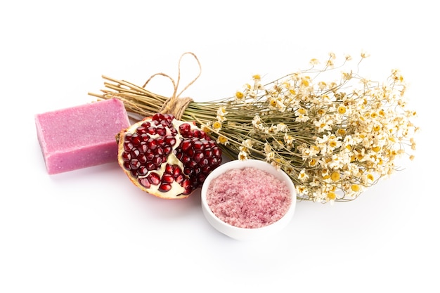 Natural cosmetics with lavender and pomegranate, for homemade spa on white background top view mock up.