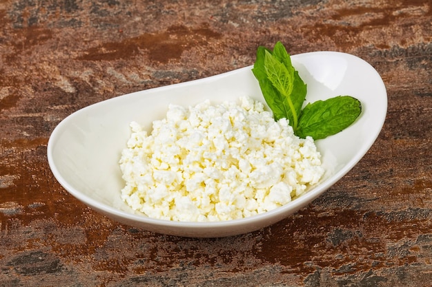 Natural cottage cheese served mint leaves