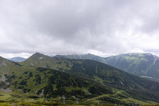 Natural daytime view of the Polish Tatra Mountains with hiking trails popular with tourists