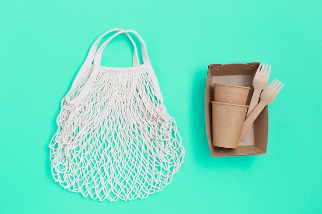 Natural eco-friendly disposable utensils and Mesh textile bag.