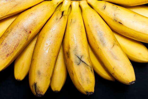 Natural fresh banana closeup on a black background