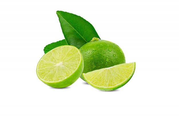 Natural fresh lime with water drops and slice of green lime citrus fruit stand isolated on white 