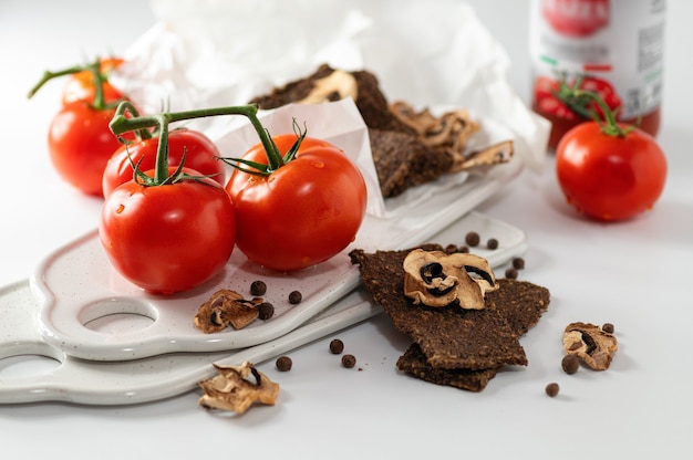 Photo natural gluten-free breads without flour and without sugar with mushrooms and tomatoes and tomato puree