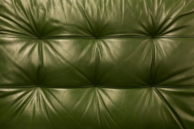 Natural green colored leather texture background.  vintage cow skin backdrop design.