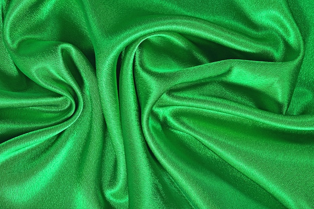 Natural green satin fabric as background texture