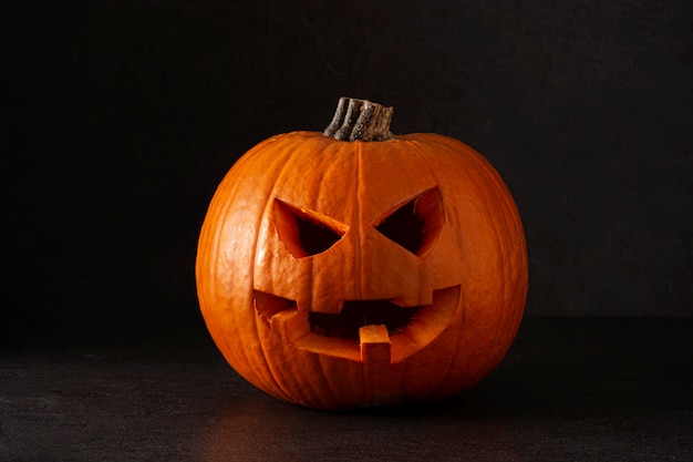 Natural halloween pumpkin isolated on black background