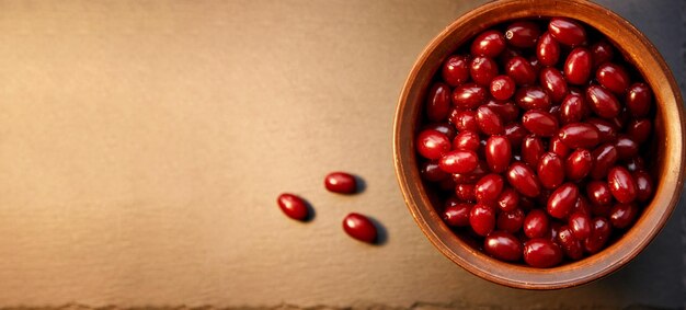 Natural healthy dogwood berry in the clay bowl Autumn healthy food Healthy vitamin organic food Top view Extra wide banner