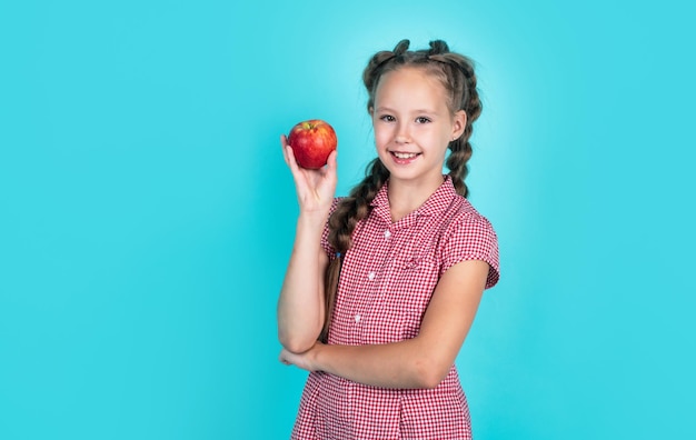 Natural and healthy happy childhood kid eat apple child with fruit teen girl carry apples autumn harvest spring season fruits full of vitamins organic food only hot summer