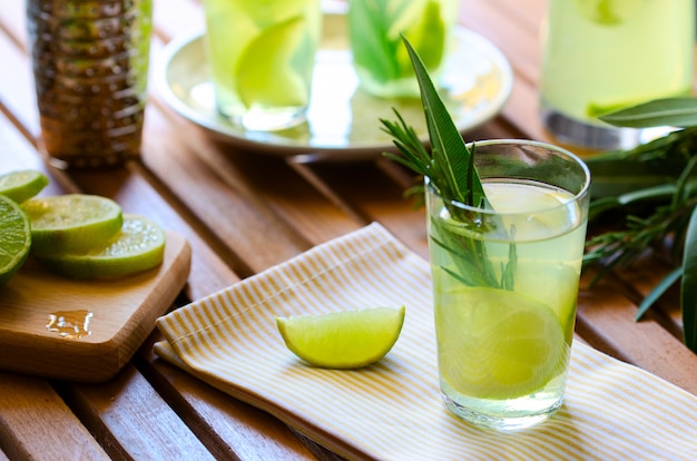 Natural homemade lemonade with lemon, rosemary and mint