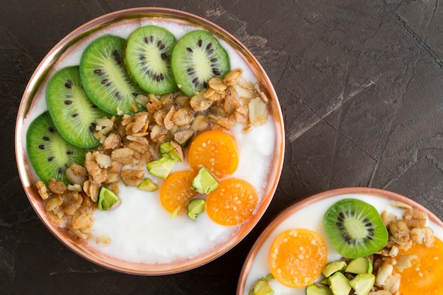 Natural homemade yogurt with ground-cherry on a wooden table.