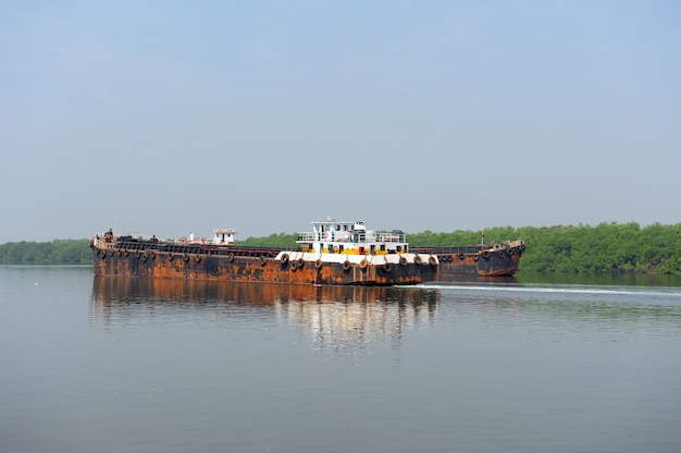 Natural landscape. water transport. barge floating on the river.