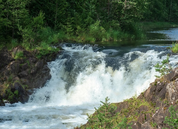 natural landscape with a small waterfall with clear water