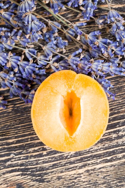 Natural lavender flowers and slices of orange apricots
