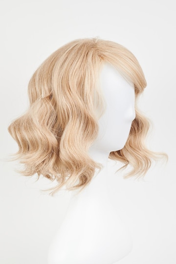 Premium Photo  Natural looking blonde wig on white mannequin head