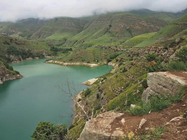 Natural monument, mountain lake Gizhgit with deep green water. Elbrus region, Kabardino-Balkarian