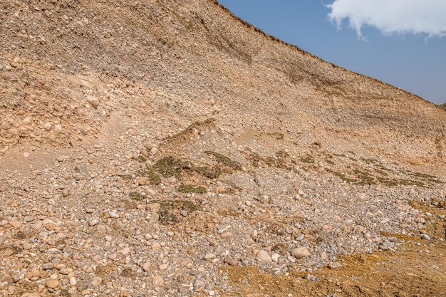 Natural natural gravel in nature in a quarry closeup