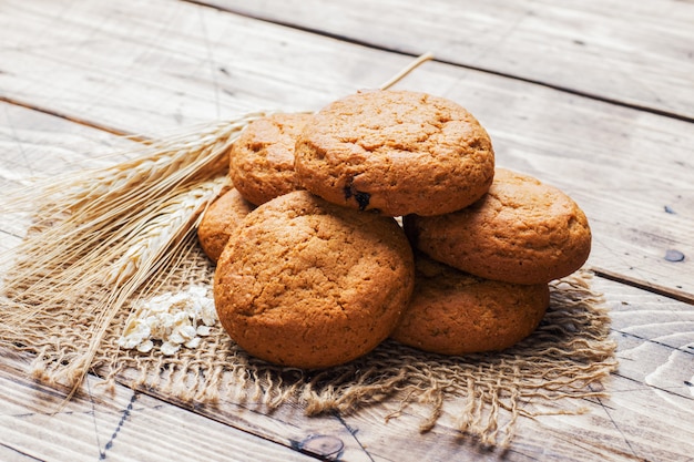 Natural oatmeal cookies on wooden . Rustic style. copyspace