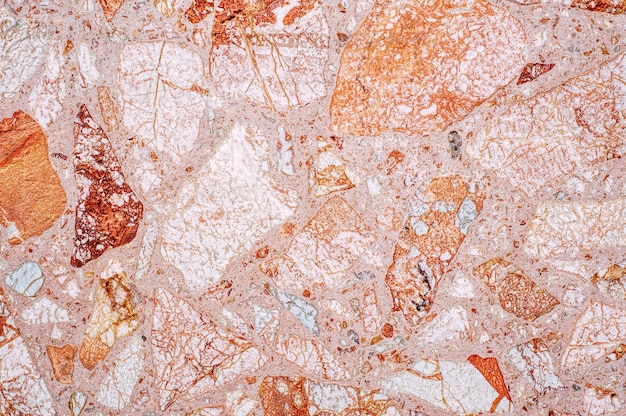 Photo natural orange marble surface, top view.